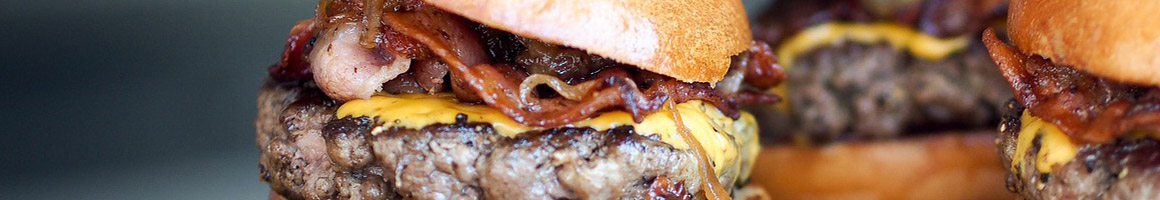 Eating Burger Fast Food at Ted's Hamburgers restaurant in Tulsa, OK.